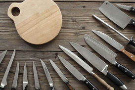 An-assortment-of-kitchen-knives-around-a-cutting-board-768.jpeg